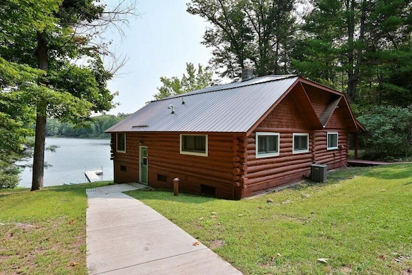 Sloped walk down to the side entry.