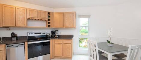 Coffee/tea maker, fridge, microwave, oven