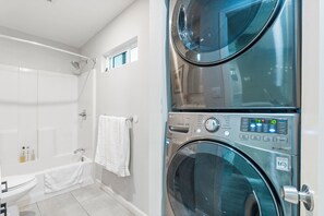 Hair dryer, towels, soap, shampoo