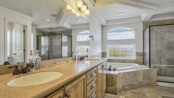 Separate tub and shower, hair dryer, towels, soap