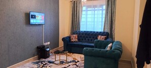 Elite Apartment | Living area | Flat-screen TV - Lux Suites Cavendish Square Apartments (Mlolongo)