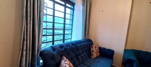 Elite Apartment | Living area | Flat-screen TV - Lux Suites Cavendish Square Apartments (Mlolongo)