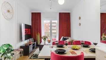 Apartment | Living area | 50-inch TV with digital channels