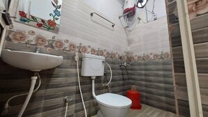 Shower, rainfall showerhead, towels - Goroomgo Aradhya Regency Konark (Gop)