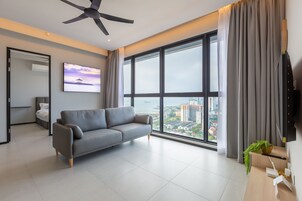 Executive Apartment, 3 Bedrooms | Living area | Flat-screen TV