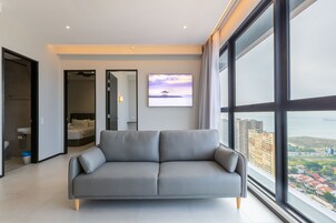 Executive Apartment, 3 Bedrooms | Living area | Flat-screen TV