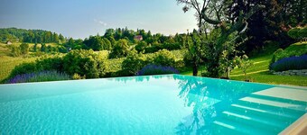 The Rizzi - Detached vacation home with infinity pool in Southern Styria
