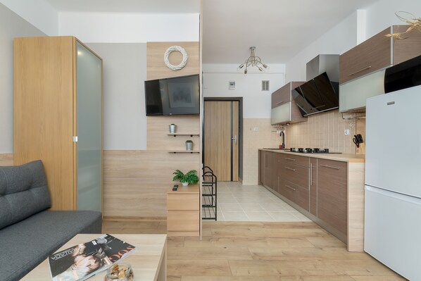 Studiolejlighed - køkken | Stue