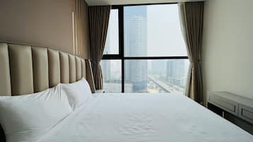 2 bedrooms, premium bedding, desk, laptop workspace