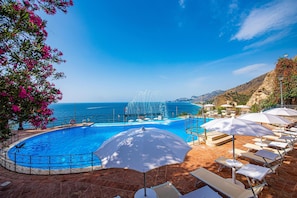 2 outdoor pools, pool umbrellas, pool loungers