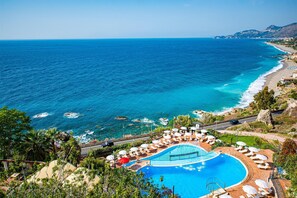 2 outdoor pools, pool umbrellas, sun loungers