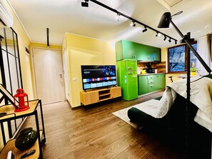 Leilighet – executive | Oppholdsområde | TV