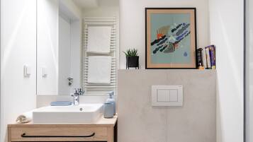 Standard Studio | Bathroom | Shower, towels, soap, shampoo