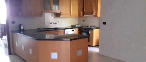 Apartment | Private kitchen | Fridge, oven, stovetop, electric kettle