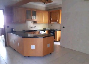 Apartment | Private kitchen | Fridge, oven, stovetop, electric kettle