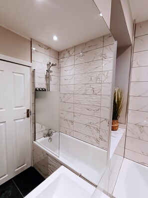 Hair dryer, towels, soap, shampoo