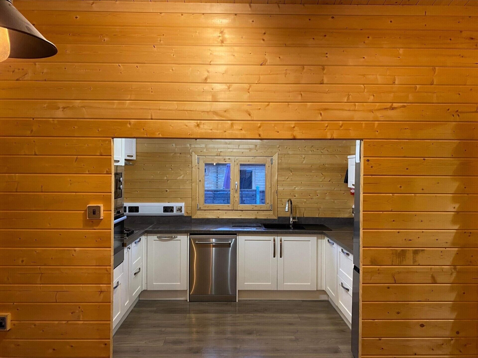 Cabin | Private kitchen | Fridge, microwave, oven, stovetop
