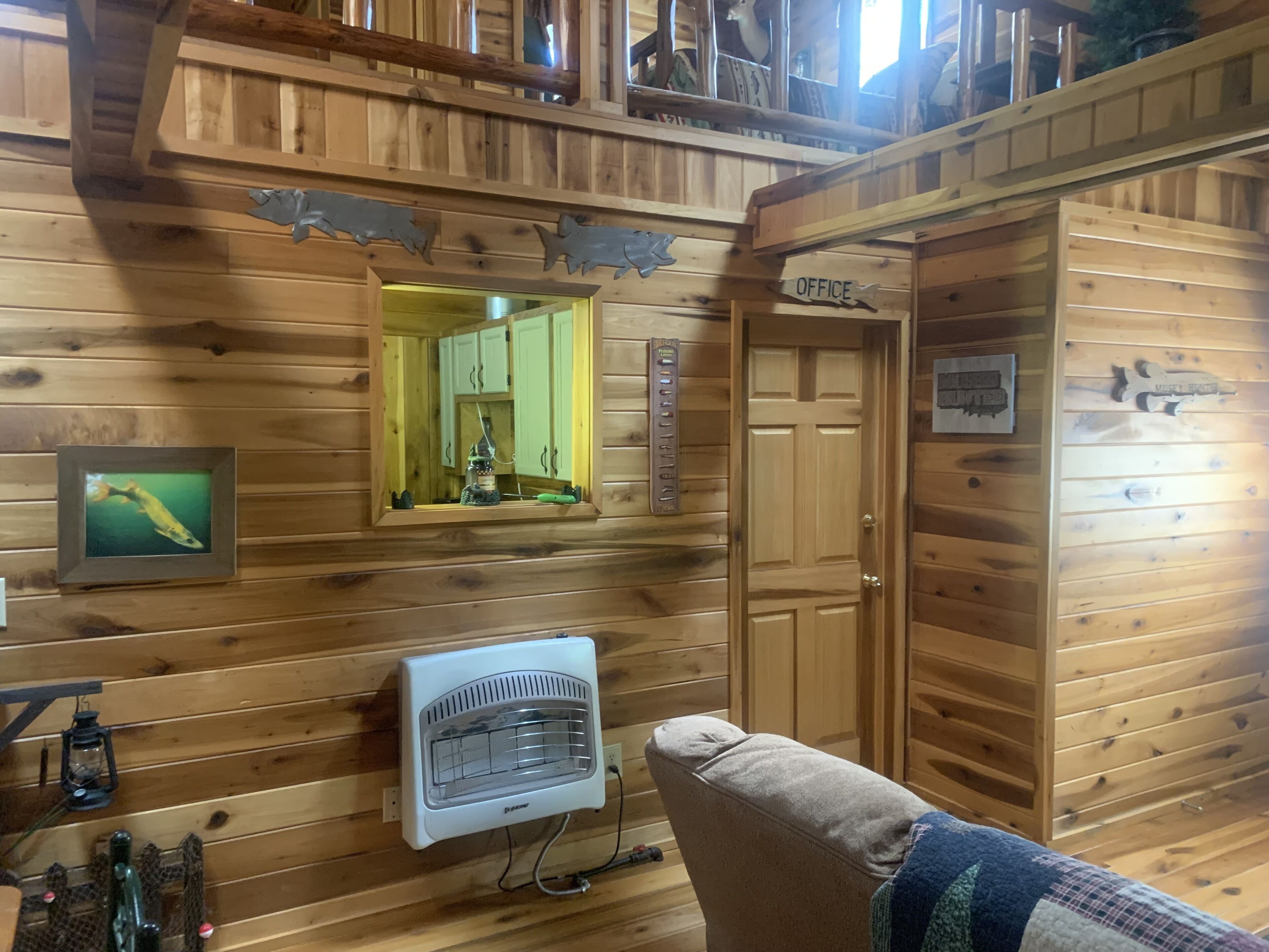 lower level - viewing window from kitchen into main room. 