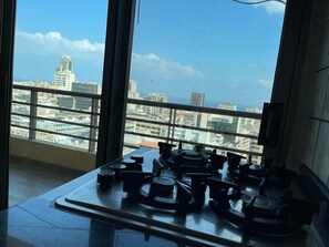 Full-size fridge, microwave, cookware/dishes/utensils, dining tables - New Home Residence (Beirut)