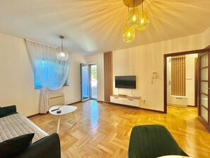 Comfort Apartment | Living area | 32-inch LCD TV with cable channels - Comfort One Bedroom Apartment  (Budva)