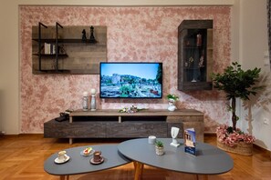 Appartamento Luxury | Area soggiorno | Smart TV 55 pollici con canali digitali