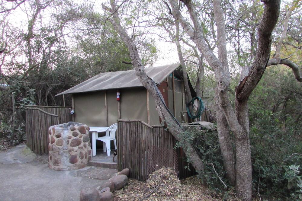 Romantic canvas pad on river, share shower with monkeys and listen to the lions