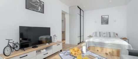 1 dormitori, planxa i posts de planxar, wifi i roba de llit