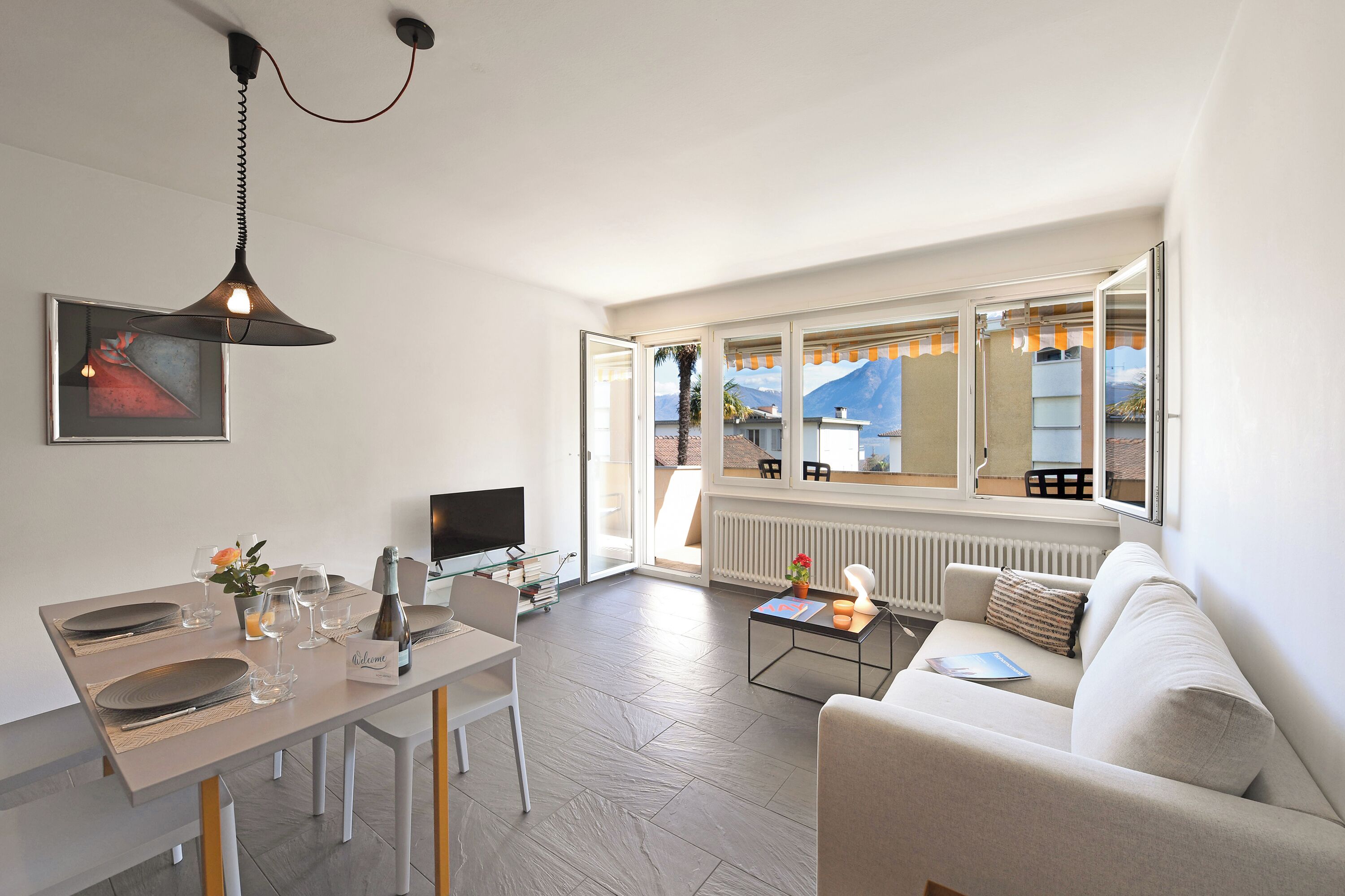 Family Apartment, Multiple Bedrooms (Malibu46) | Living area | 21-inch flat-screen TV with cable channels, TV