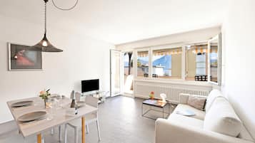 Family Apartment, Multiple Bedrooms (Malibu46) | Living area | 21-inch flat-screen TV with cable channels, TV