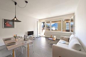 21-inch flat-screen TV with cable channels, TV