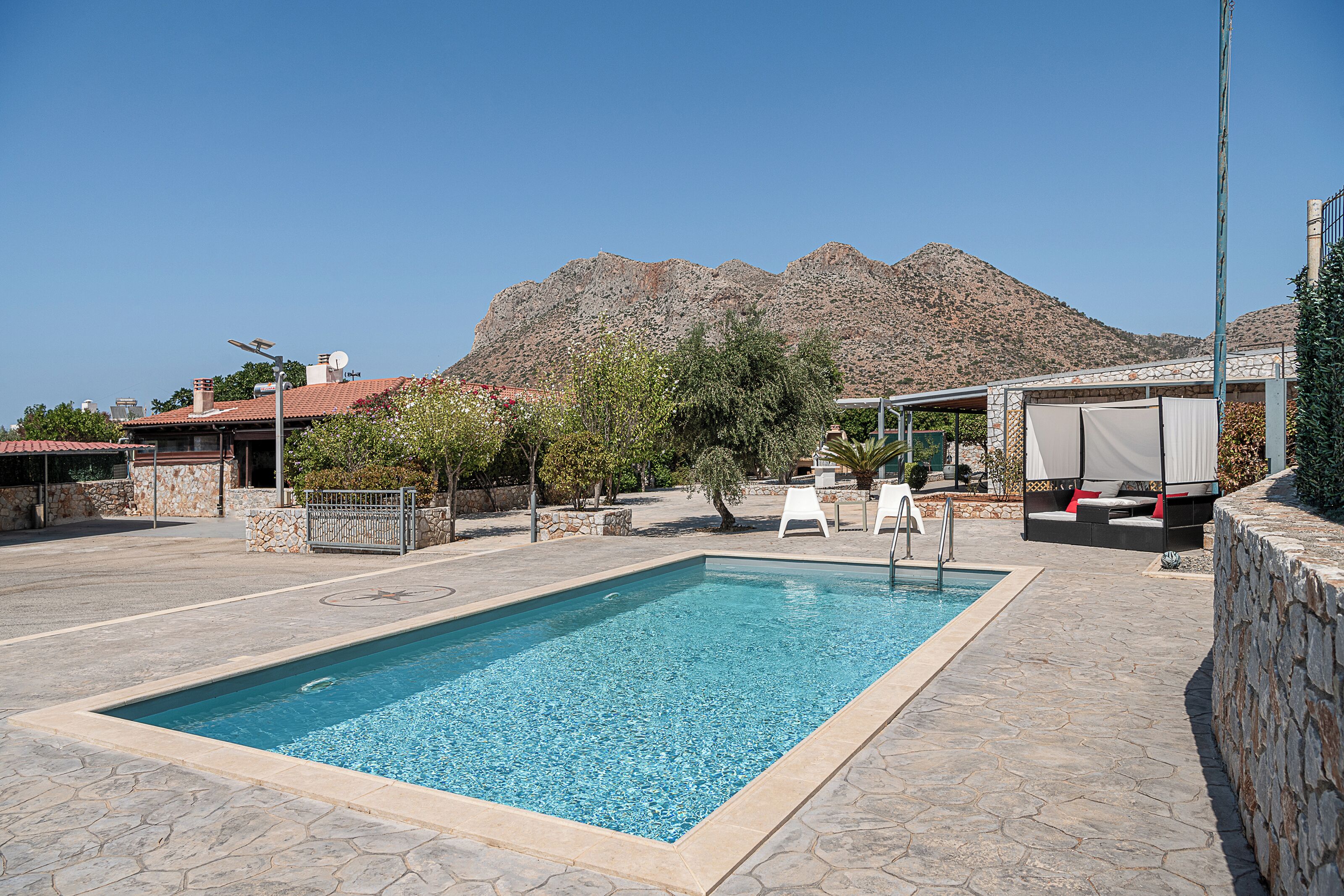 Seasonal outdoor pool, pool umbrellas, pool loungers