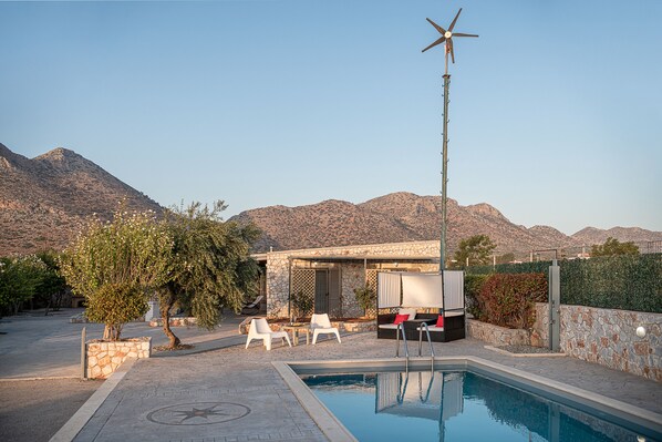 Seasonal outdoor pool, pool umbrellas, pool loungers