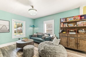 TV, fireplace - Historic Hideaway, Your Family's Coastal Haven: Walkable, Pool, Spacious, Pet Friendly (Saint Augustine)