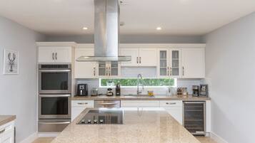 Microwave, stovetop, dishwasher, coffee/tea maker