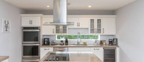 Microwave, stovetop, dishwasher, coffee/tea maker