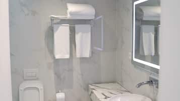 Standard Double Room | Bathroom | Shower, hair dryer, slippers, towels