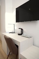 Premium bedding, down comforters, in-room safe, desk