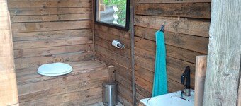 Discover a serene Gourits River glamping retreat at Fisant Kloof Cabin.
