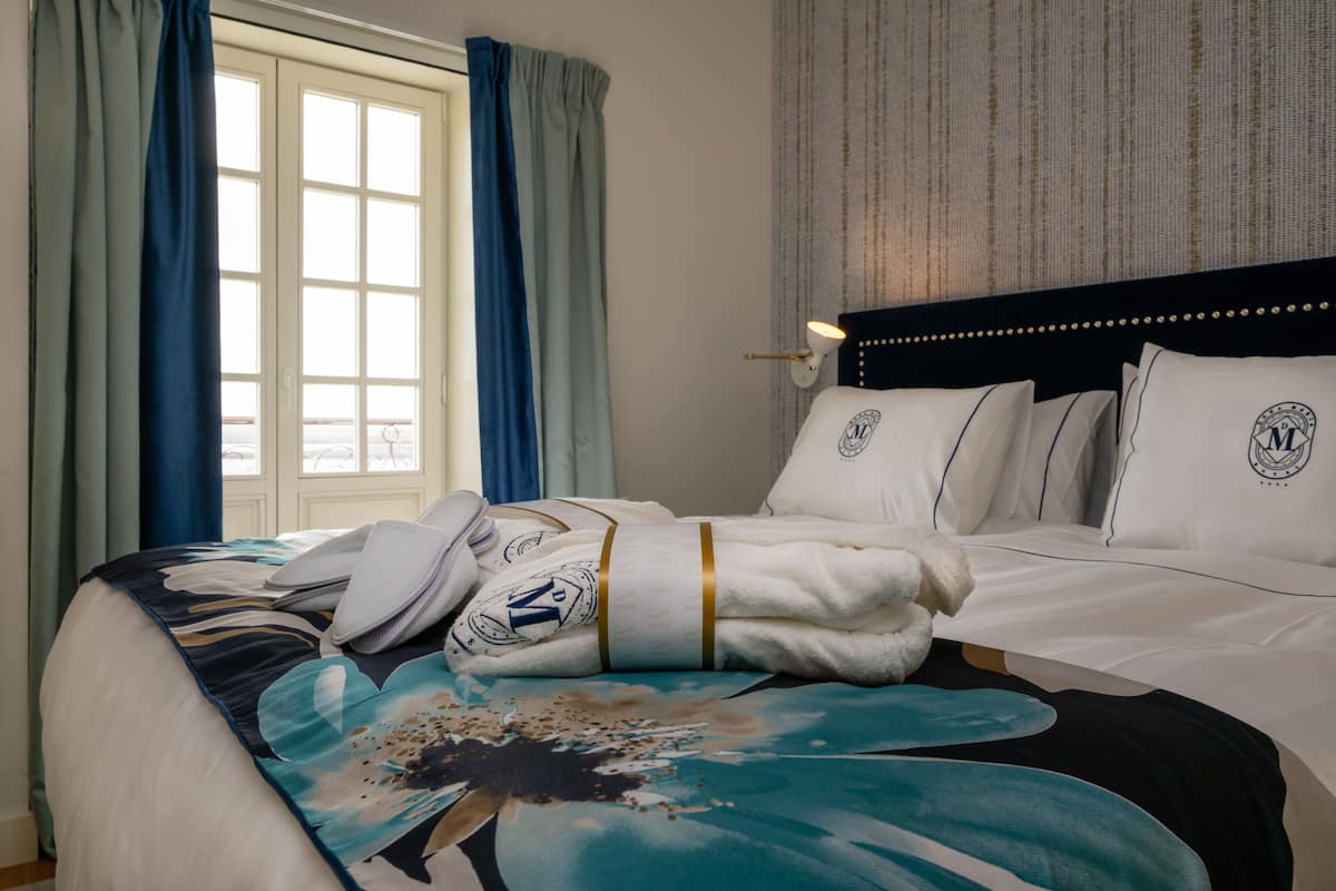 Suite Deluxe | 1 camera, copriletto in piuma, materassi in memory foam, minibar