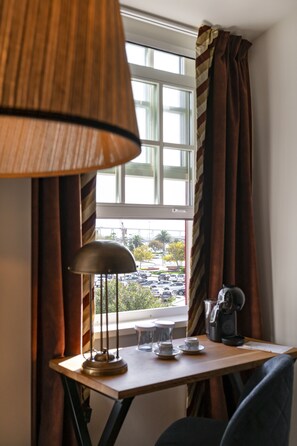 Family Room | Down duvets, memory-foam beds, minibar, in-room safe - Dona Maria Hotel (Figueira da Foz)