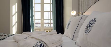 Habitación clásica | Edredón, camas con efecto memoria y minibar