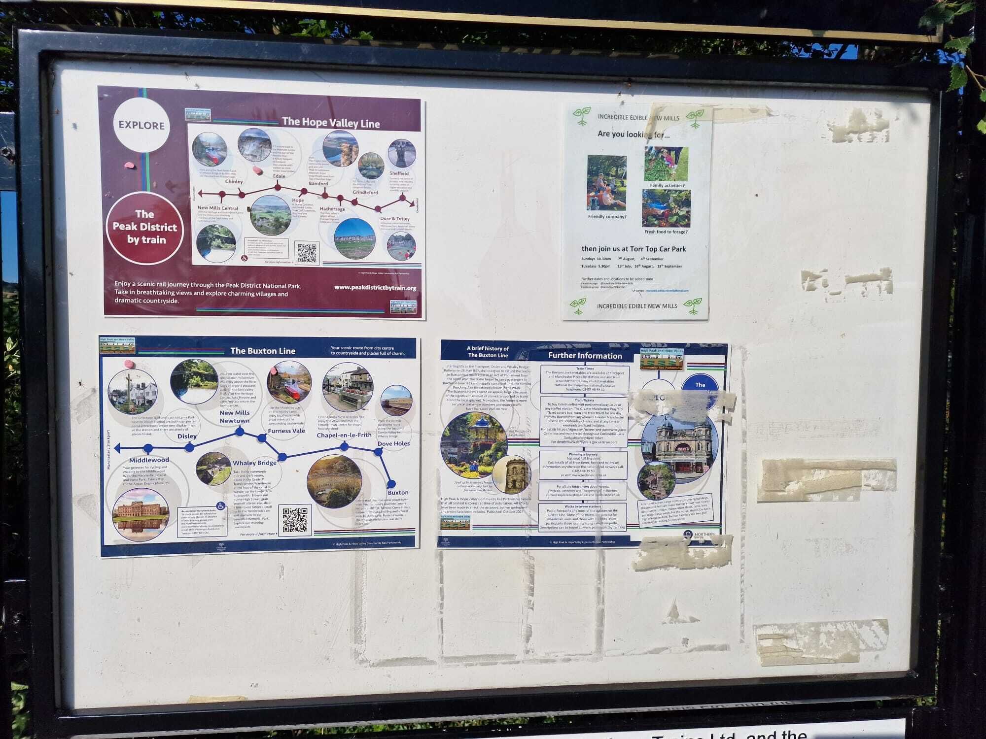A travel information board with sections on The Hope Valley Line, The Buxton Line, and a brief history of The Buxton Line.