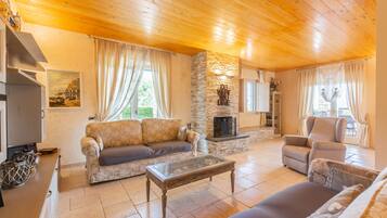 Villa, Terrace, Mountainside | Living room | Flat-screen TV