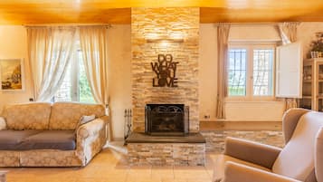 Villa, Terrace, Mountainside | Living room | Flat-screen TV