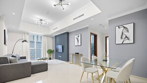 55-inch Smart TV with cable channels - Pure Living - Beautiful 1BR With View of Burj Khalifa  (Dubai)