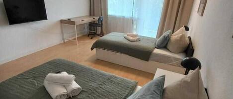 3 bedrooms, desk, iron/ironing board, travel crib