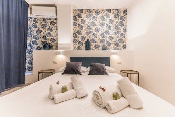 1 غرفة نوم ومكواة/لوح كي وواي فاي وملاءات أسرّة