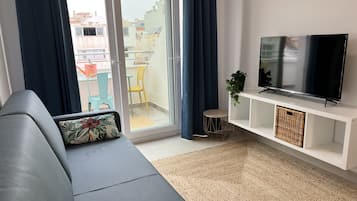 Departamento familiar (Trilocale) | Área de sala de estar | Smart TV