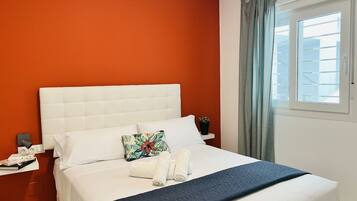 1 habitación, tabla de planchar con plancha, wifi gratis y ropa de cama