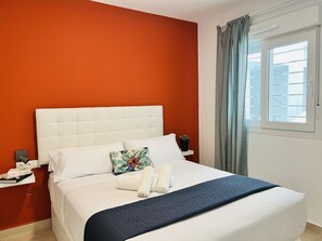 Appartement économique (Planta baja) | Fer et planche à repasser, accès au Wi-Fi (inclus), literie fournie